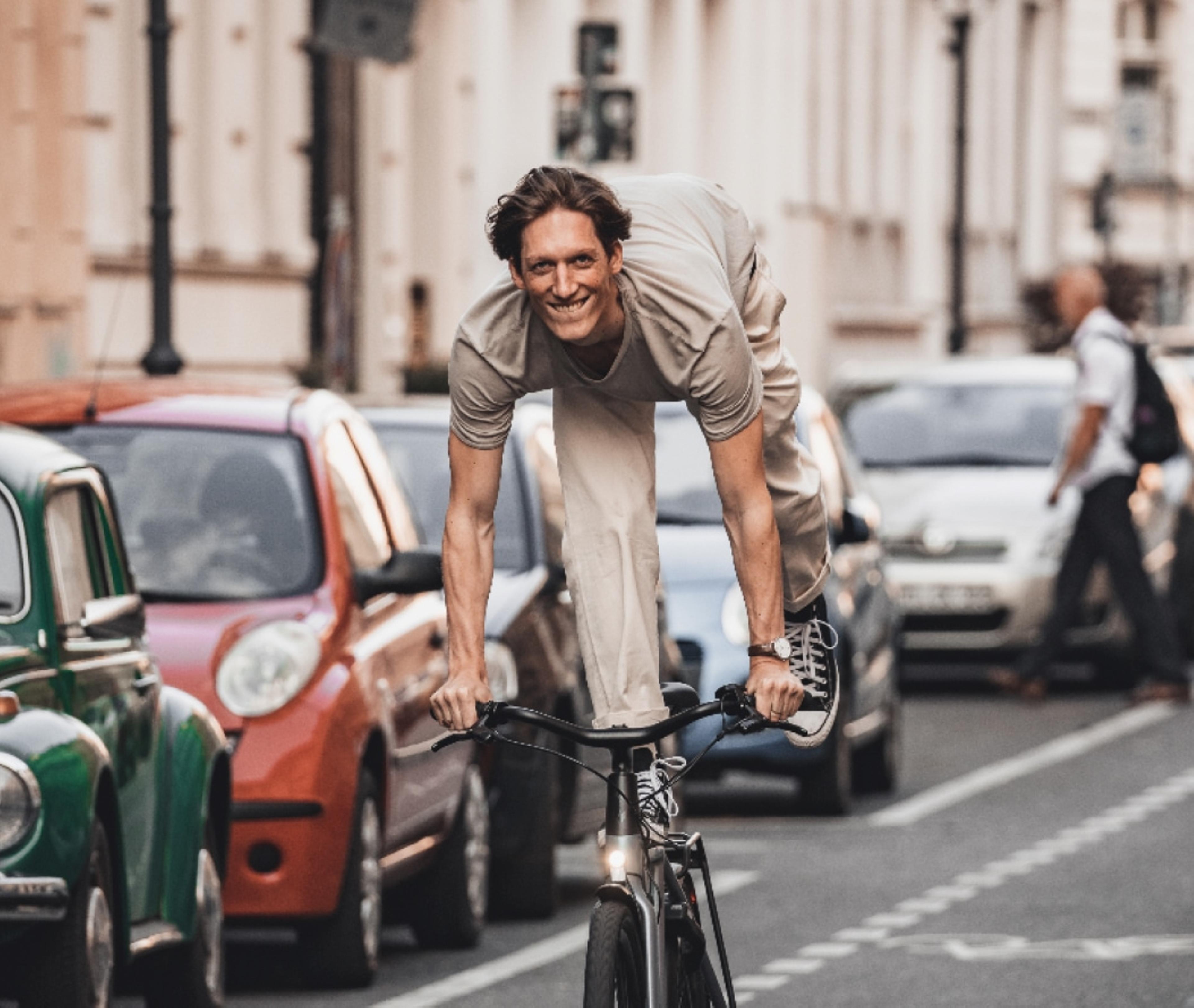 Man riding on the street on a Dance bike